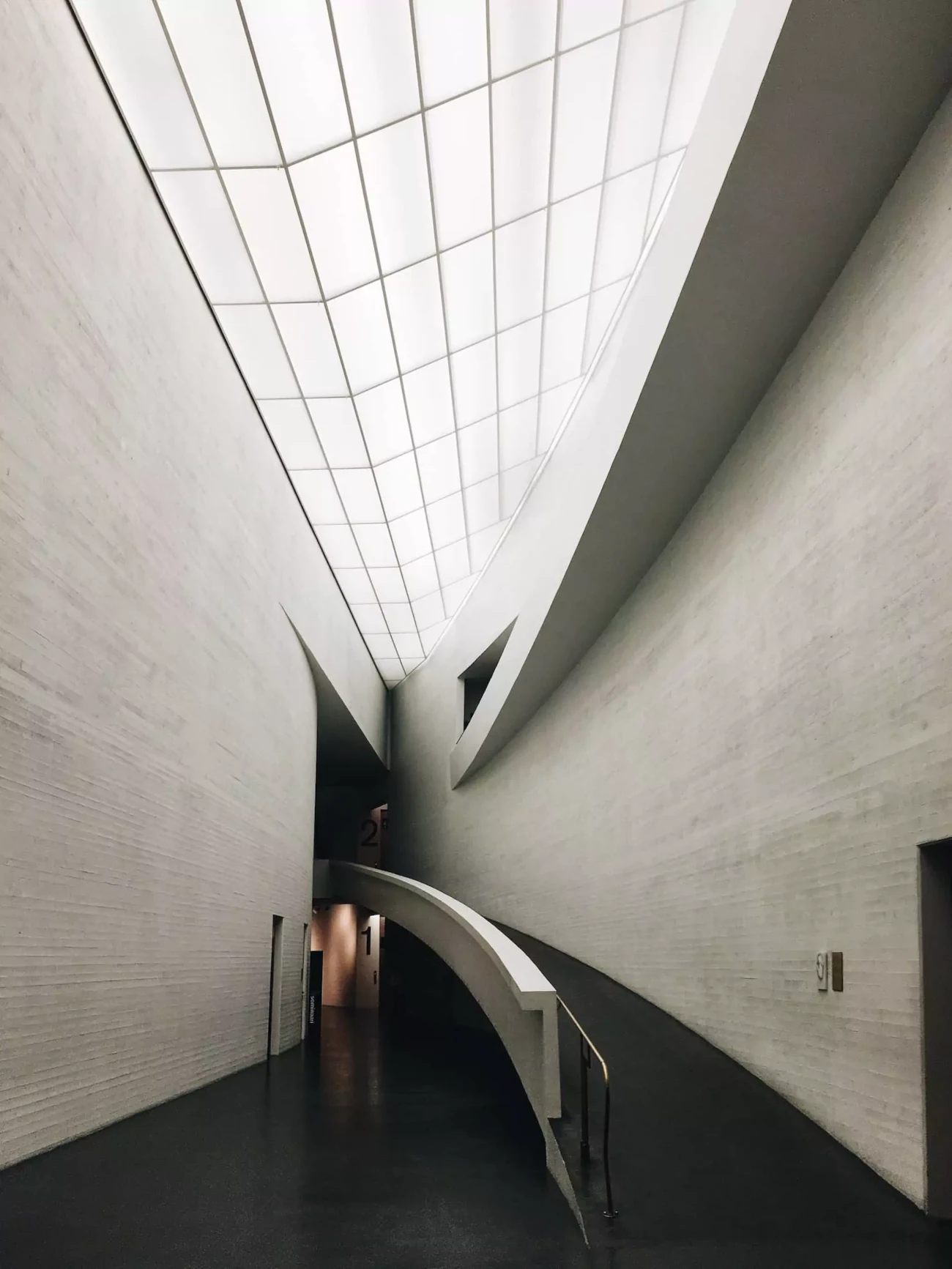 Hakkımızda 2 A ramp along a curved wall in the Kiasma Museu, Helsinki, Finland